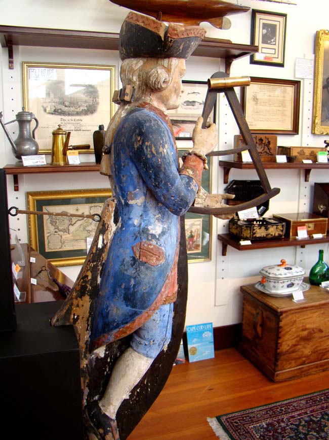 An exceptionally rare 18th century Ship Chandler's Trade Sign in the form of a French Naval Captain looking through his octant circa 1750. — image 4